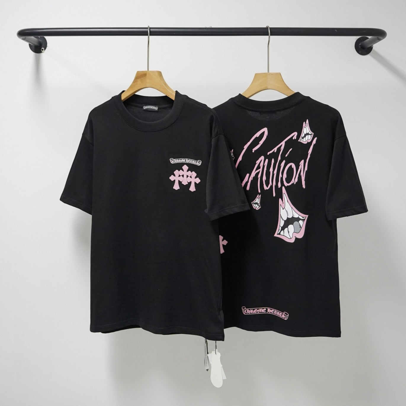 authentic chrome hearts pink caution cross graphic black tee shirt - premium designer jewelry front view