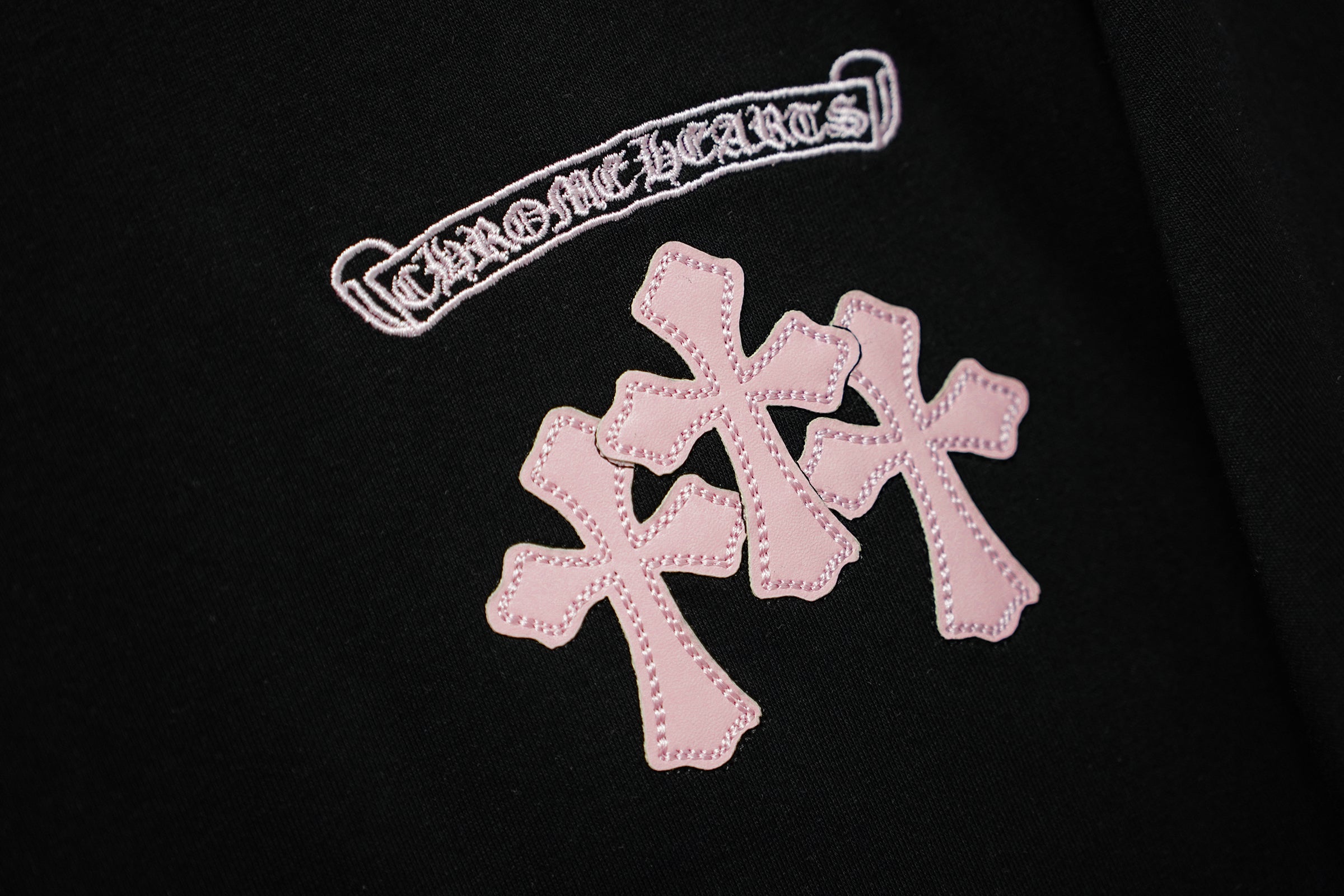 authentic chrome hearts pink caution cross graphic black tee shirt - premium designer jewelry front view