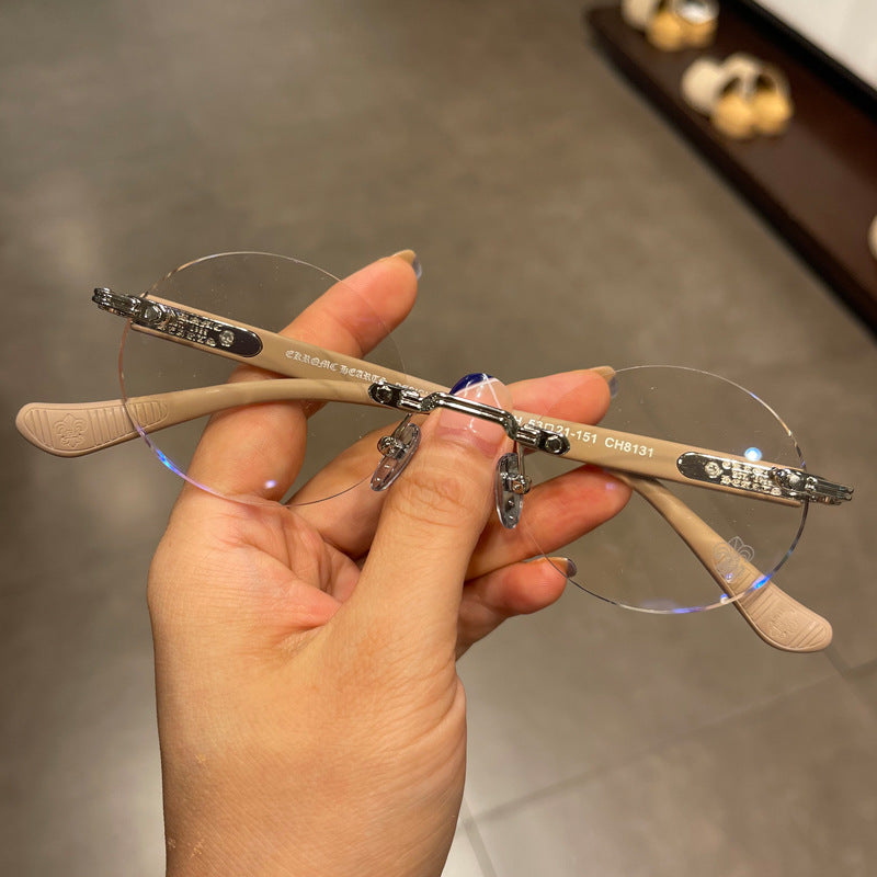 authentic chrome hearts rimeless lite brown glasses - premium designer jewelry front view
