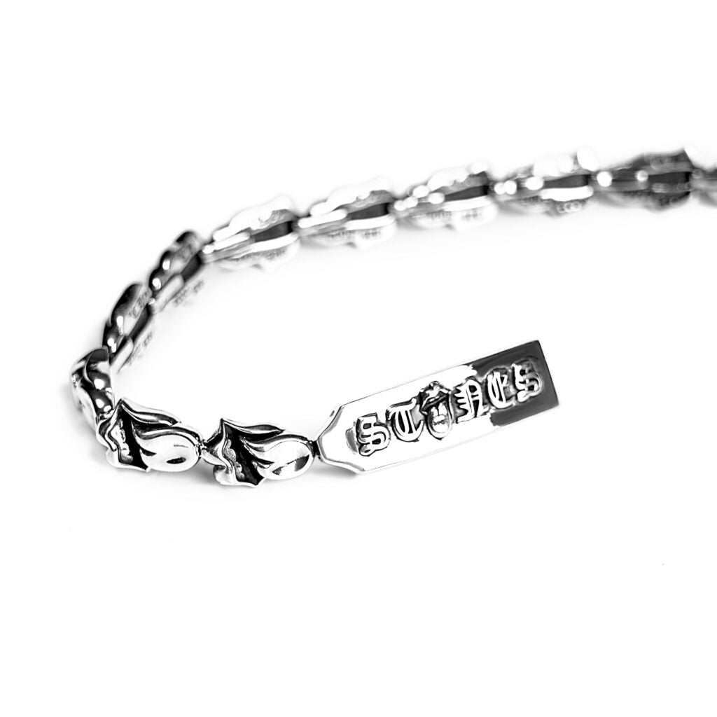 authentic chrome hearts rolling stones tongue bracelet - premium designer jewelry front view